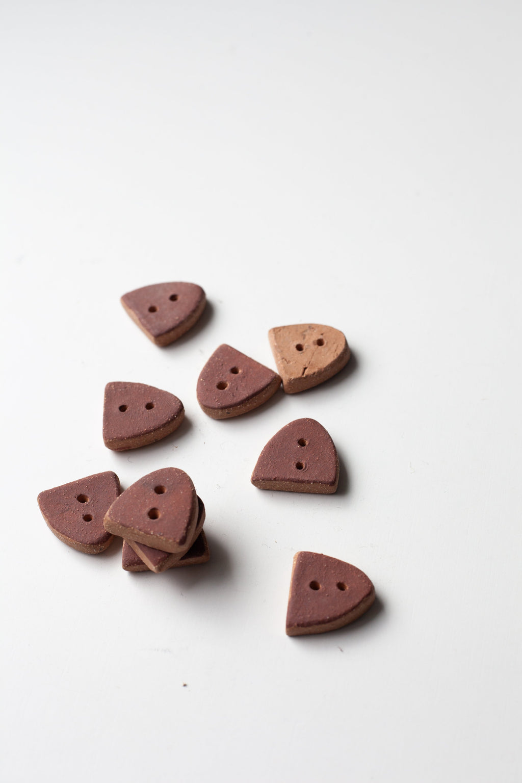 Coat of Arms Buttons by Helen Levi