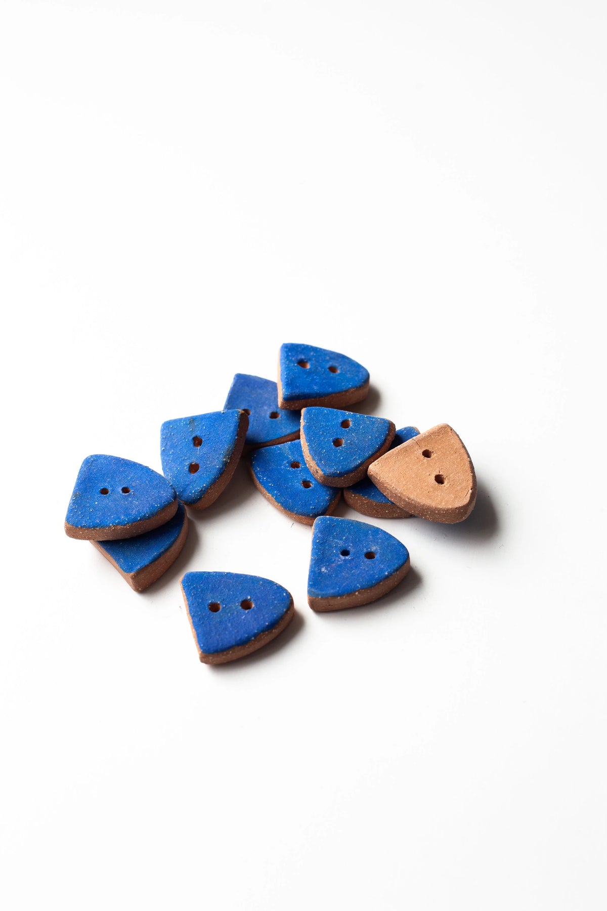 Coat of Arms Buttons by Helen Levi